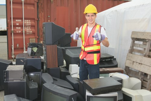 Professional waste removal team managing office waste